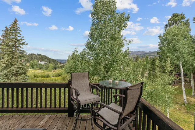 a view of a chairs on the roof deck