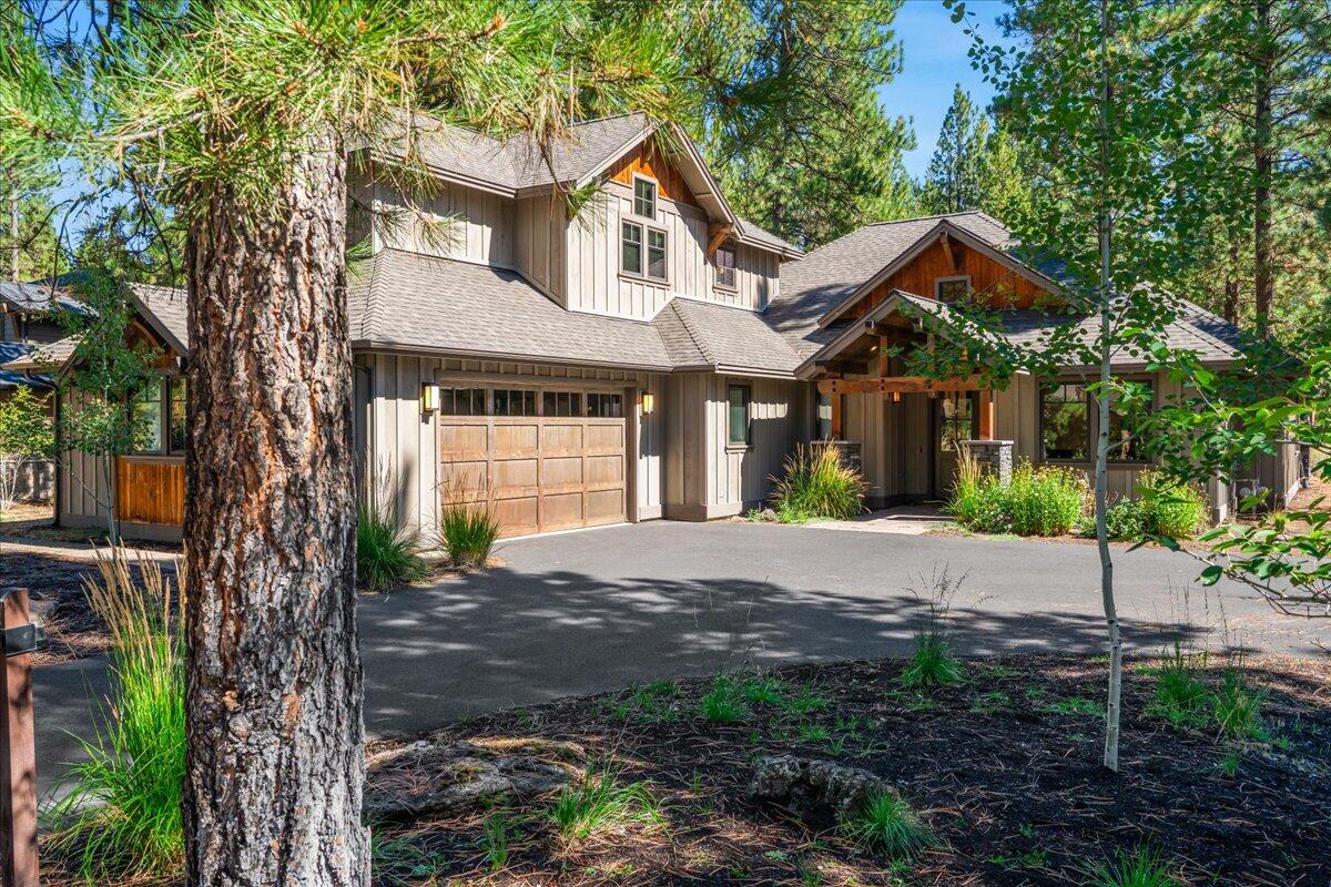 56278 Sable Rock Loop Bend, OR 97707 - Photo 1 of 54 a front view of a house with a garden