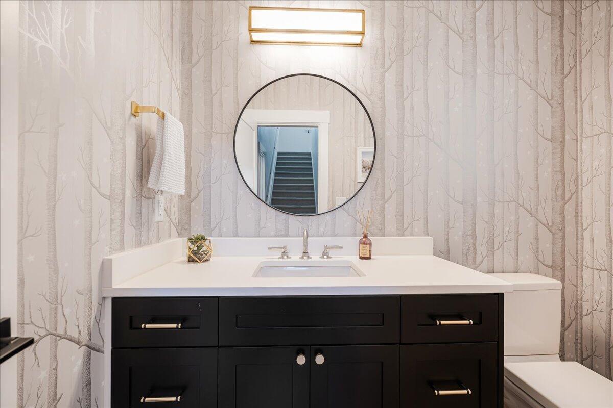 56278 Sable Rock Loop Bend, OR 97707 - Photo 30 of 54 a bathroom with a sink and a mirror