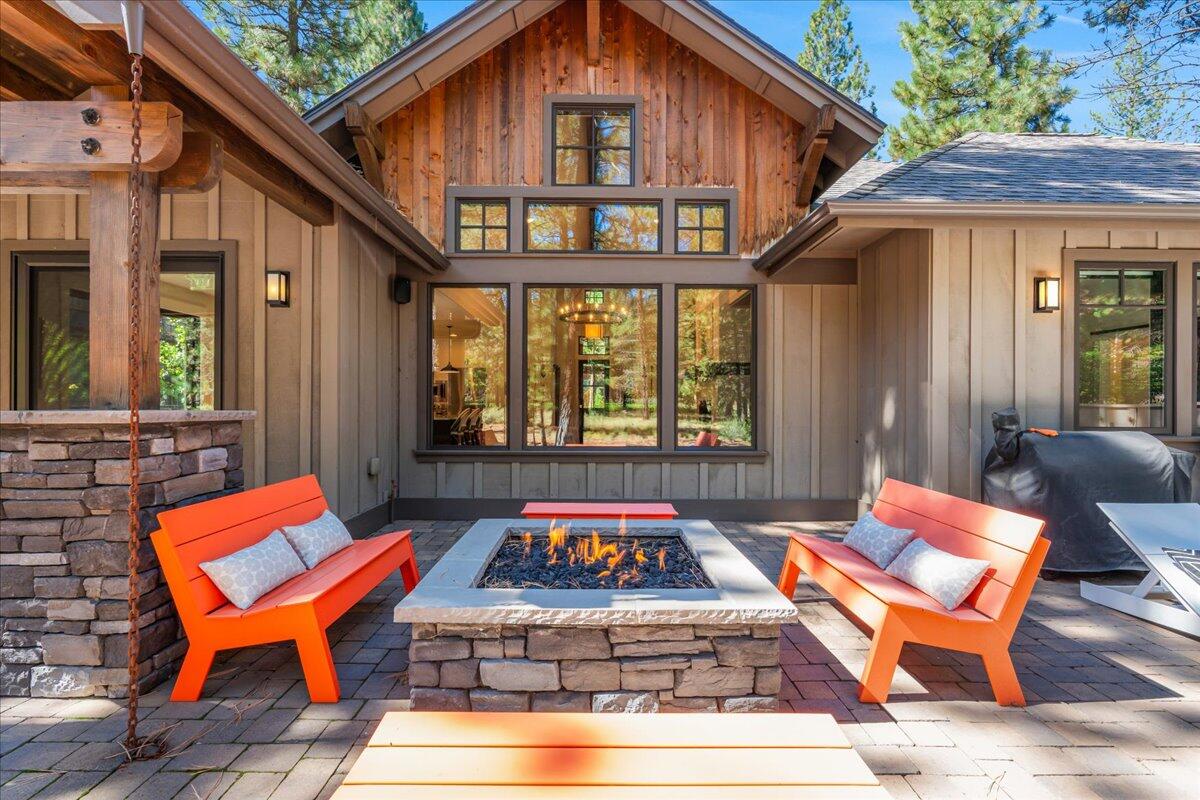 56278 Sable Rock Loop Bend, OR 97707 - Photo 40 of 54 a backyard of a house with seating space