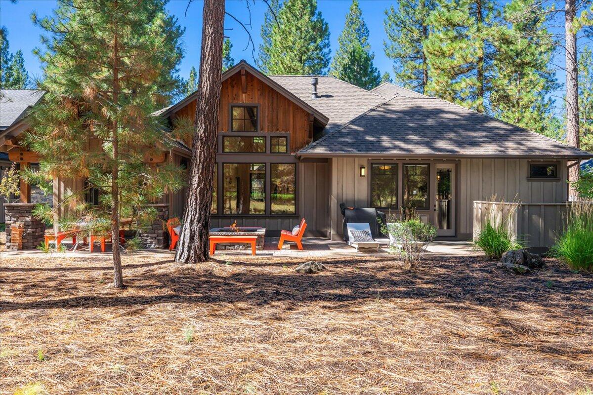 56278 Sable Rock Loop Bend, OR 97707 - Photo 42 of 54 a front view of a house with small garden