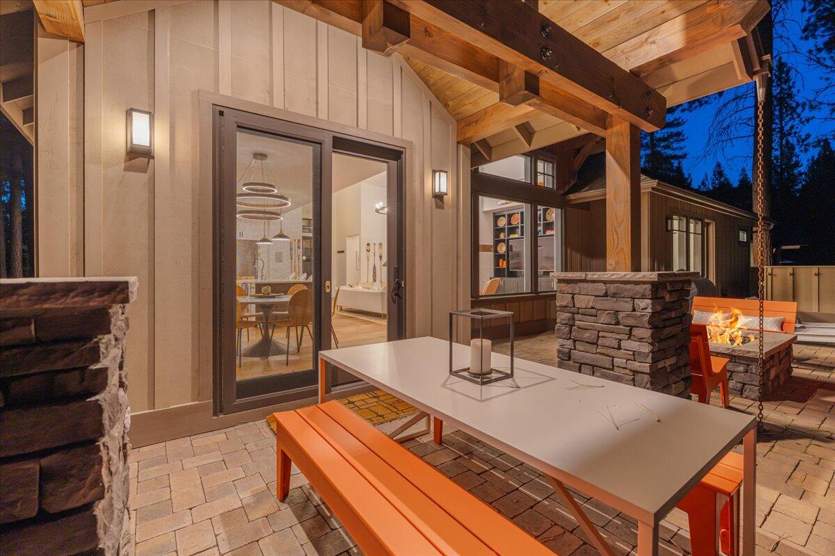56278 Sable Rock Loop Bend, OR 97707 - Photo 45 of 54 a view of a dinning table and chairs in the patio