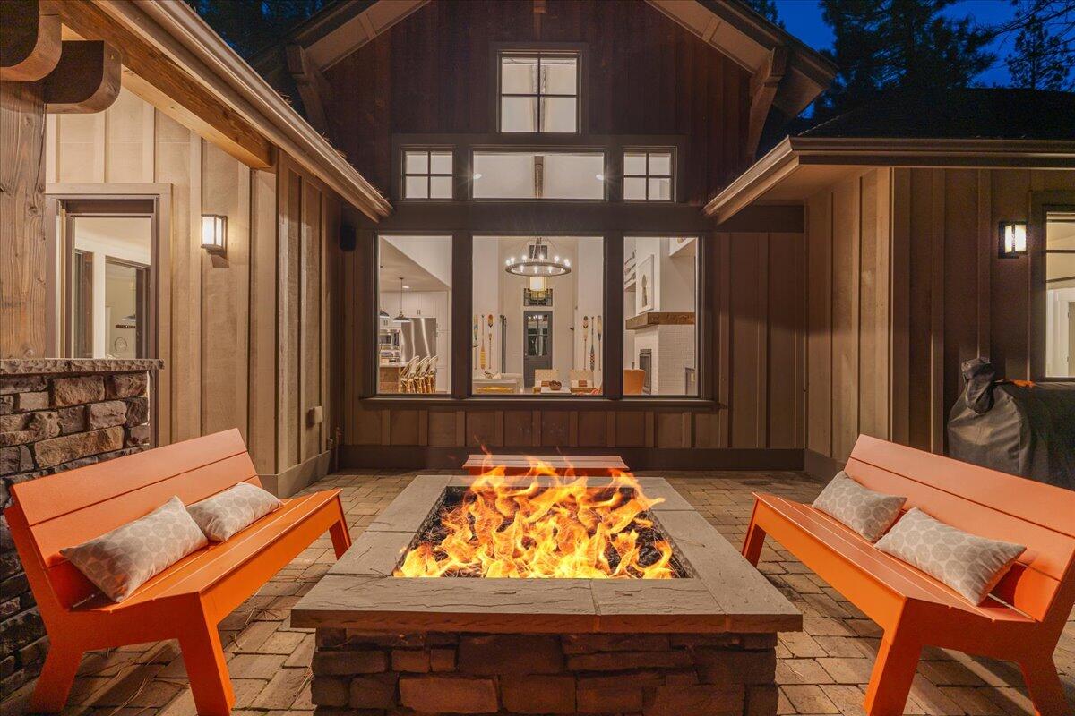 56278 Sable Rock Loop Bend, OR 97707 - Photo 46 of 54 a view of an outdoor dining space with a table and chairs