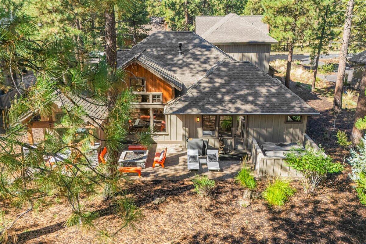 56278 Sable Rock Loop Bend, OR 97707 - Photo 51 of 54 a backyard of a house with yard and outdoor seating