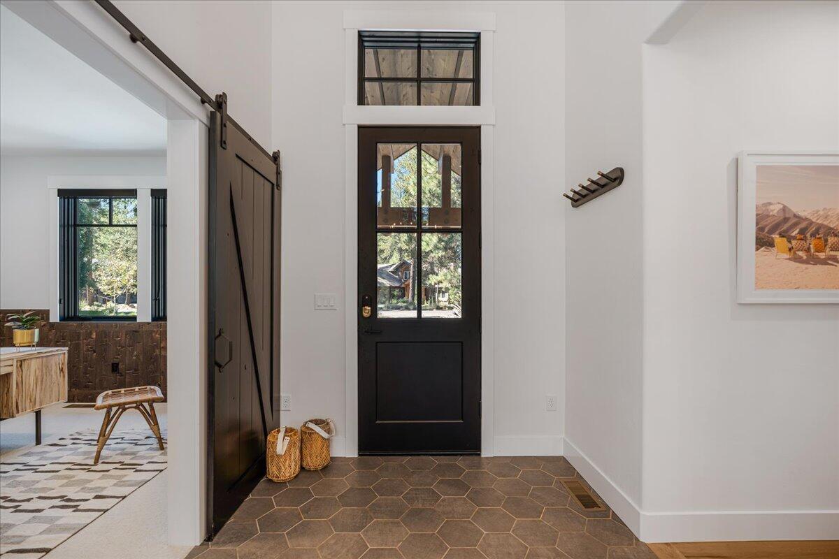 56278 Sable Rock Loop Bend, OR 97707 - Photo 5 of 54 a view of an entryway with wooden floor