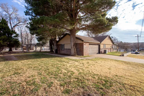 a house with trees in front of it