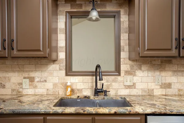 a view of a kitchen sink