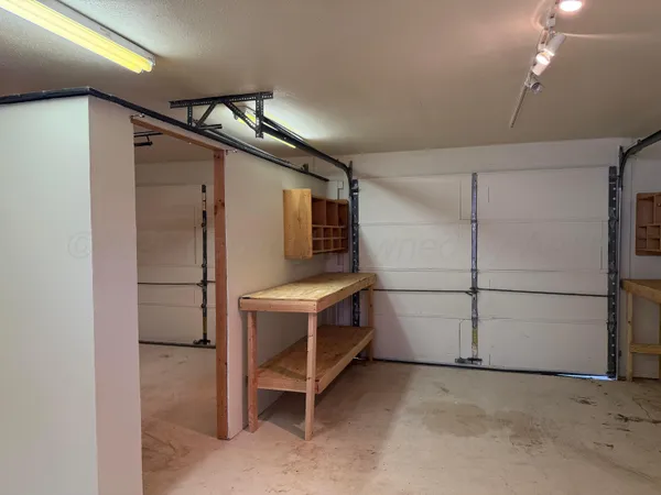 a view of a refrigerator in a room