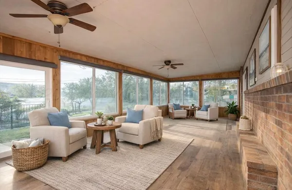a living room with furniture and a large window
