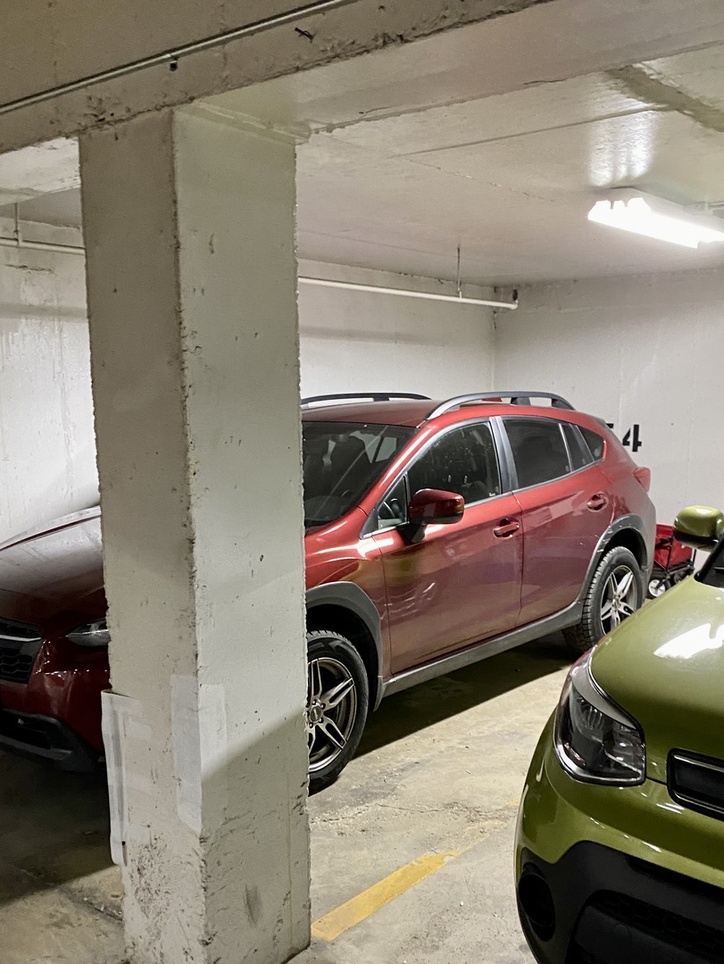 515 North Main Street, Unit 4AS Glen Ellyn, IL 60137 - Photo 21 of 23 a view of a car in garage
