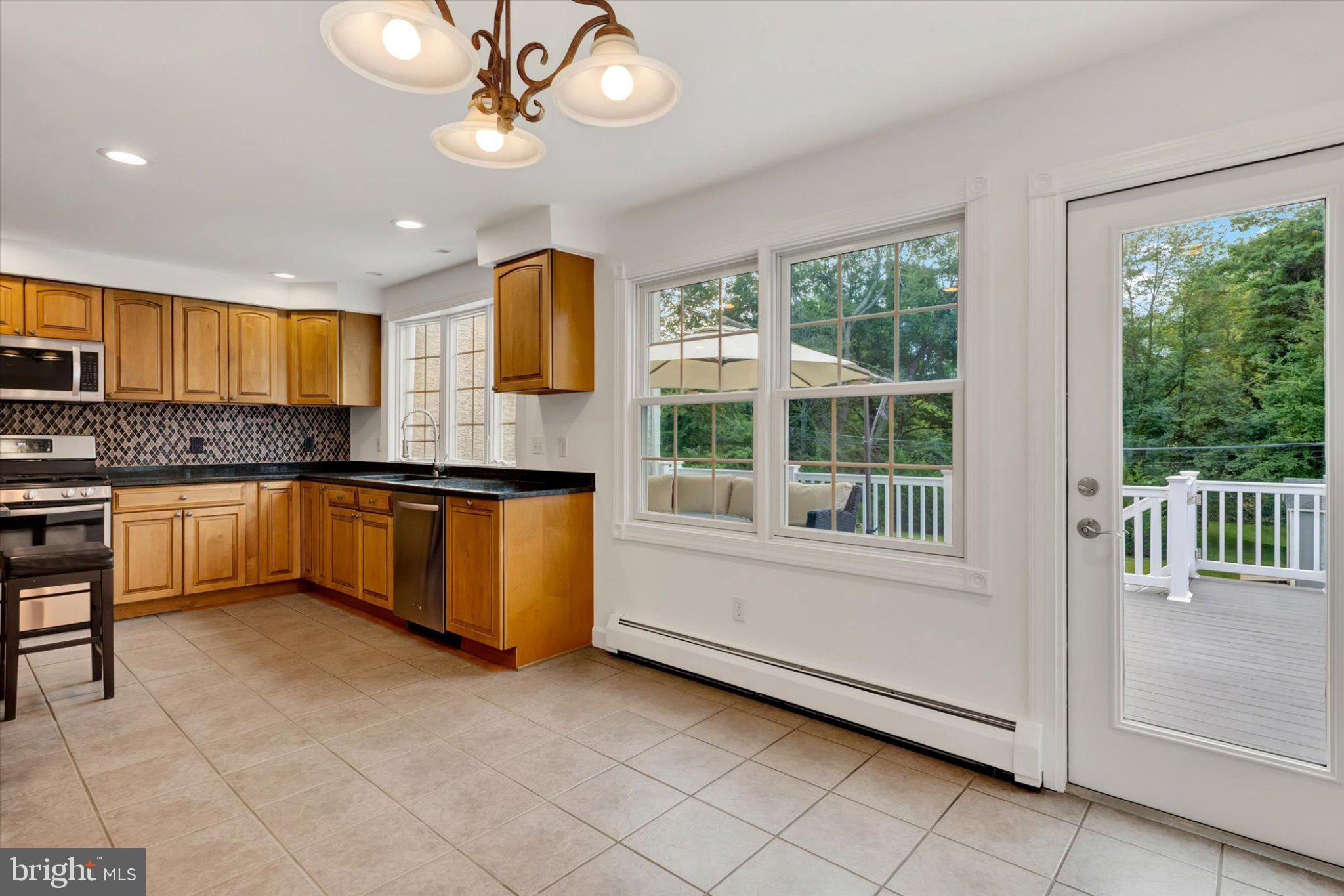 168 Mansion Road Newtown Square, PA 19073 - Photo 11 of 47 Gourmet Eat-In Kitchen with Access to Deck