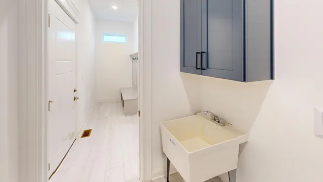 a bathroom with a sink and mirror