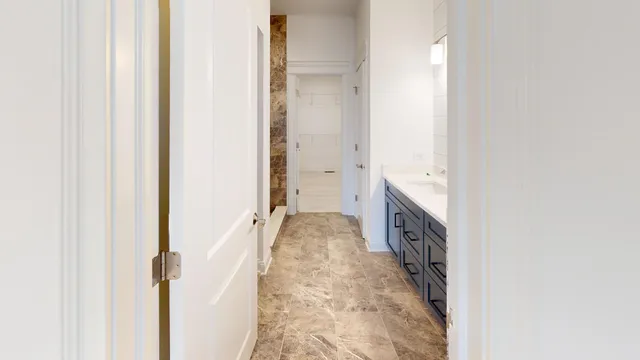 a spacious bathroom with a bathtub and shower