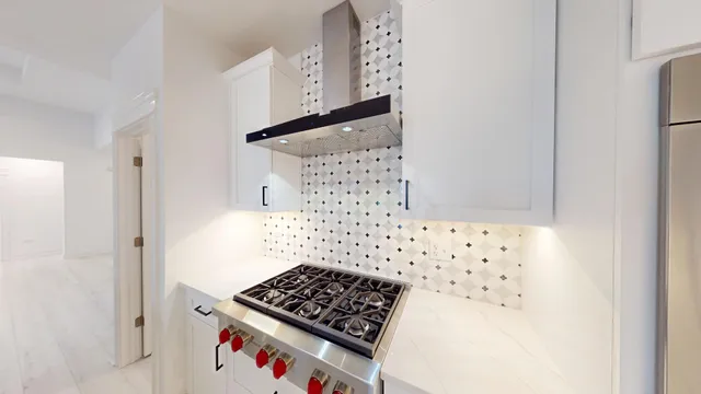 a bathroom with a bathtub and shower