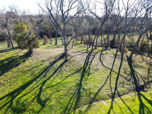 a view of swimming pool with a yard