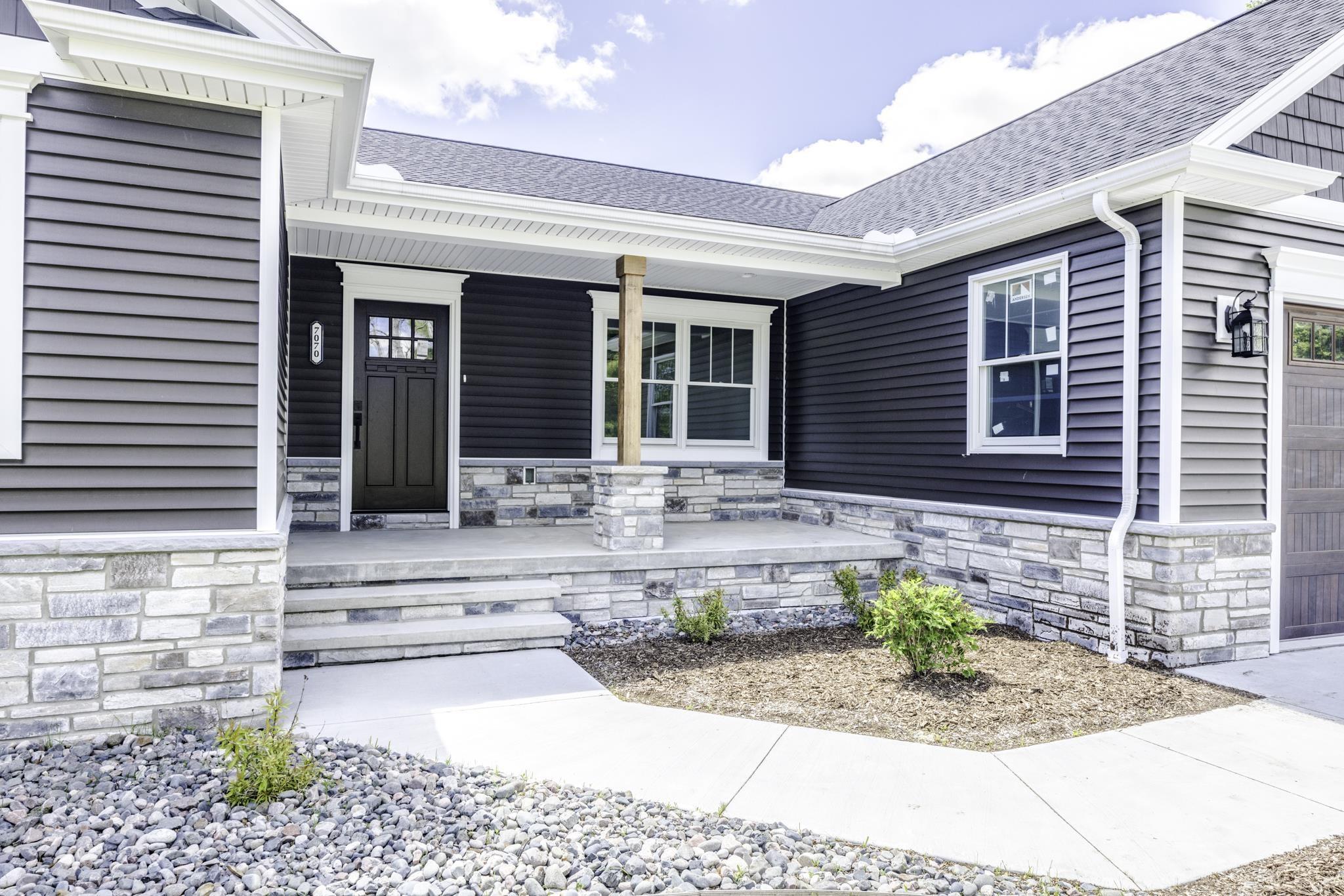 7070 Harrington Road Lexington, MI 48450 - Photo 11 of 61 Covered Front Porch