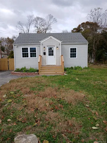 front view of a house and a yard