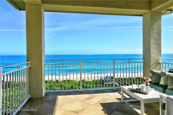 a view of a balcony with lake view