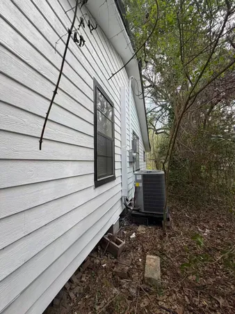 a view of a back yard of the house