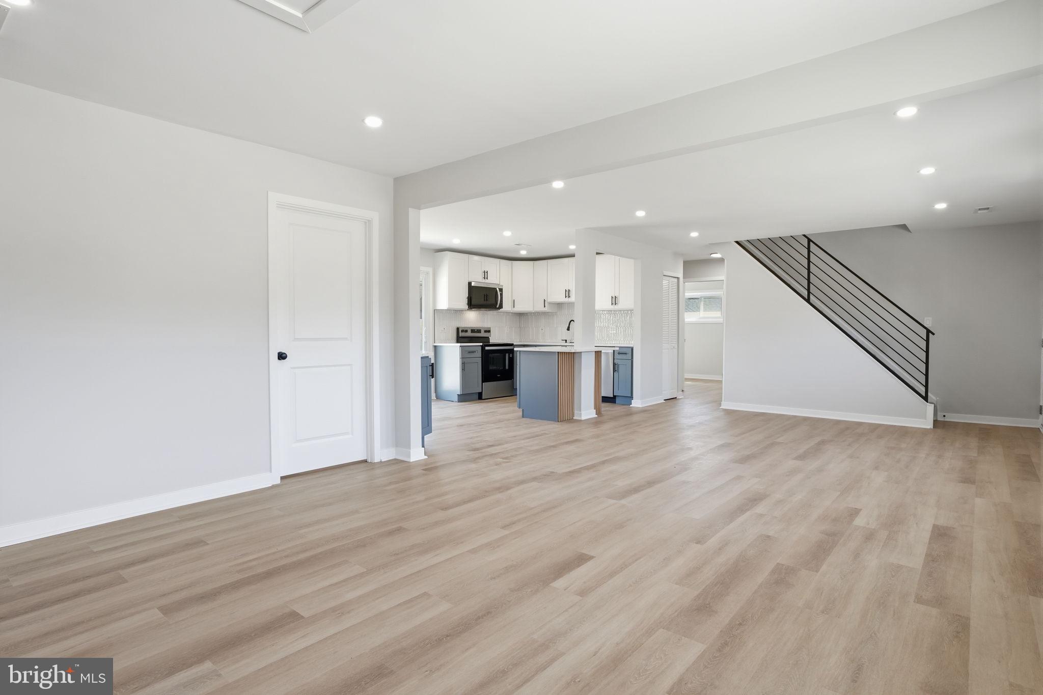 10 MacIntosh Road Levittown, PA 19056 - Photo 12 of 41 a view of a kitchen with a sink and a refrigerator