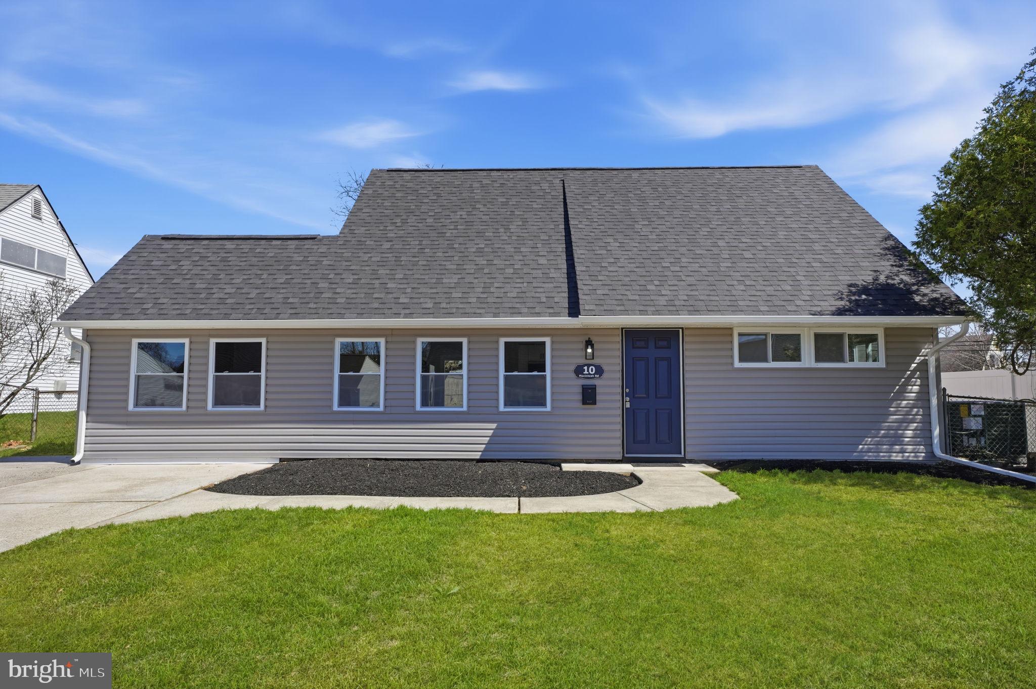 10 MacIntosh Road Levittown, PA 19056 - Photo 2 of 41 a front view of a house with a yard