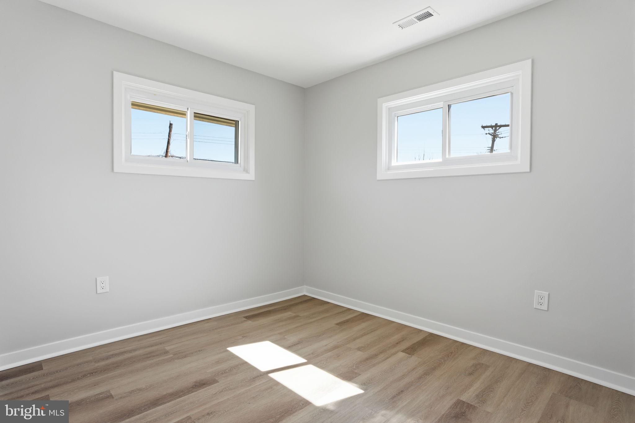 10 MacIntosh Road Levittown, PA 19056 - Photo 23 of 41 an empty room with a window