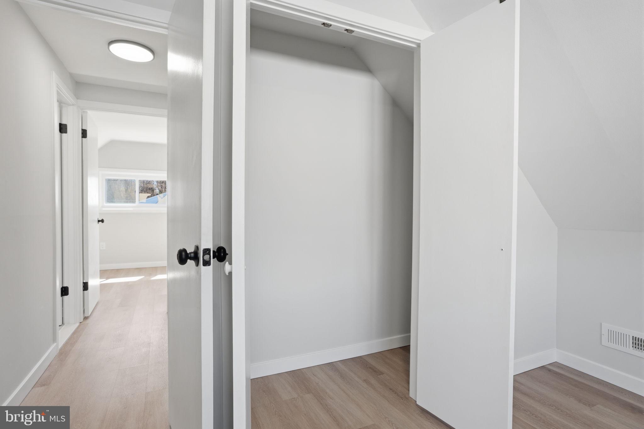 10 MacIntosh Road Levittown, PA 19056 - Photo 29 of 41 a view of a room with wooden floor closet and windows