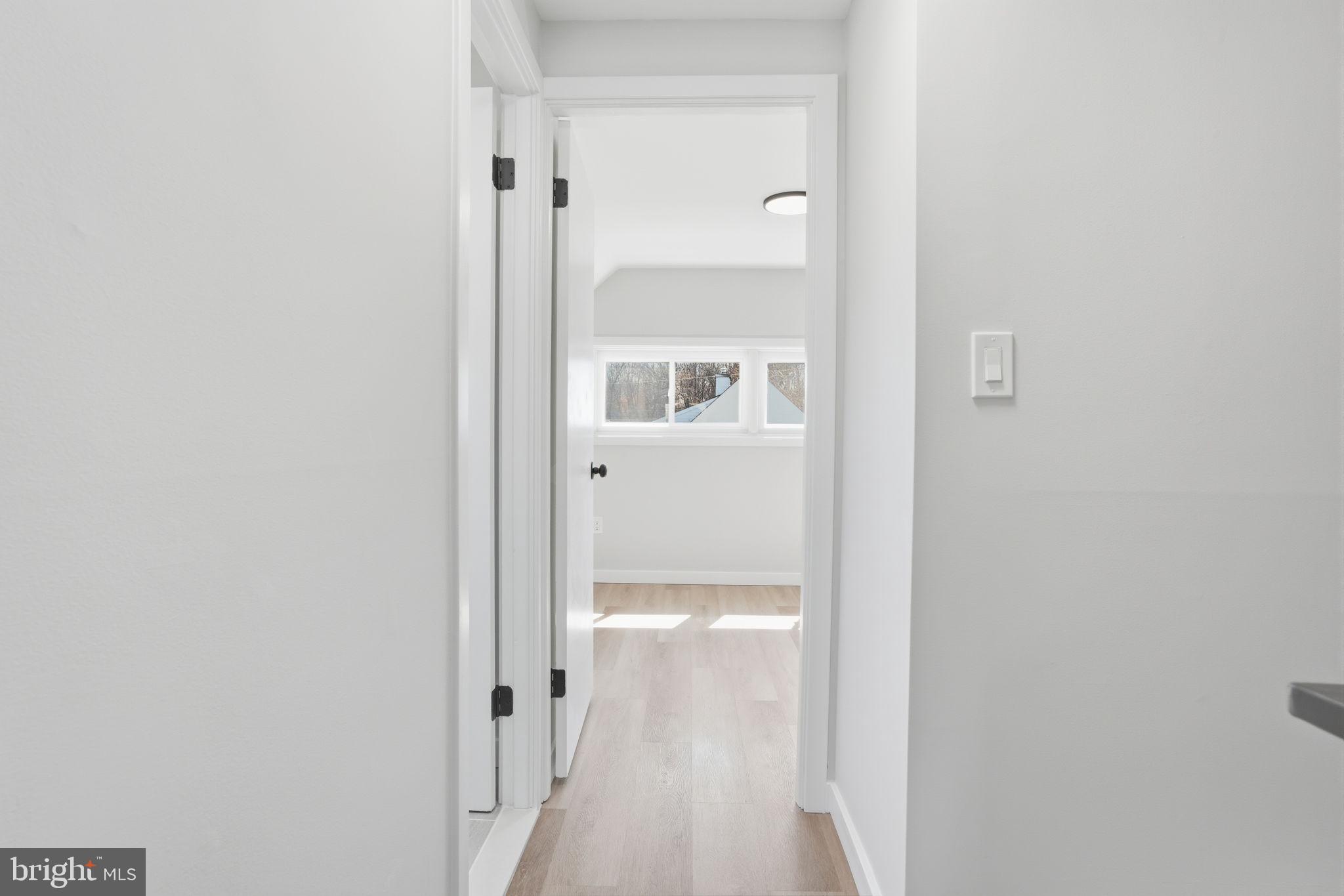 10 MacIntosh Road Levittown, PA 19056 - Photo 30 of 41 a view of a bathroom with a glass door