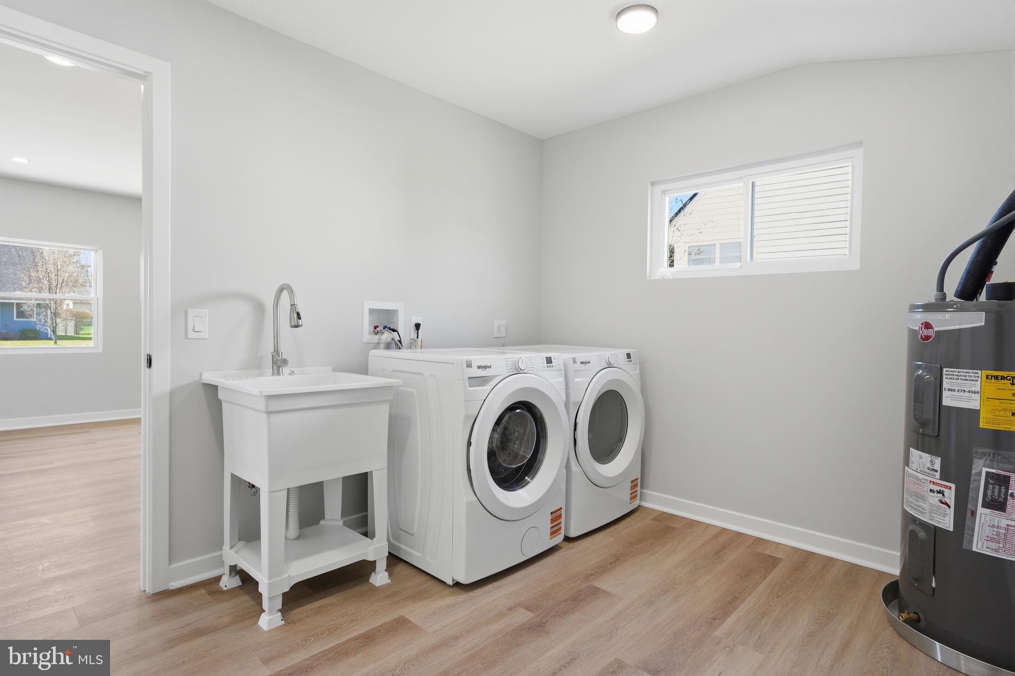 10 MacIntosh Road Levittown, PA 19056 - Photo 35 of 41 a utility room with dryer and washer