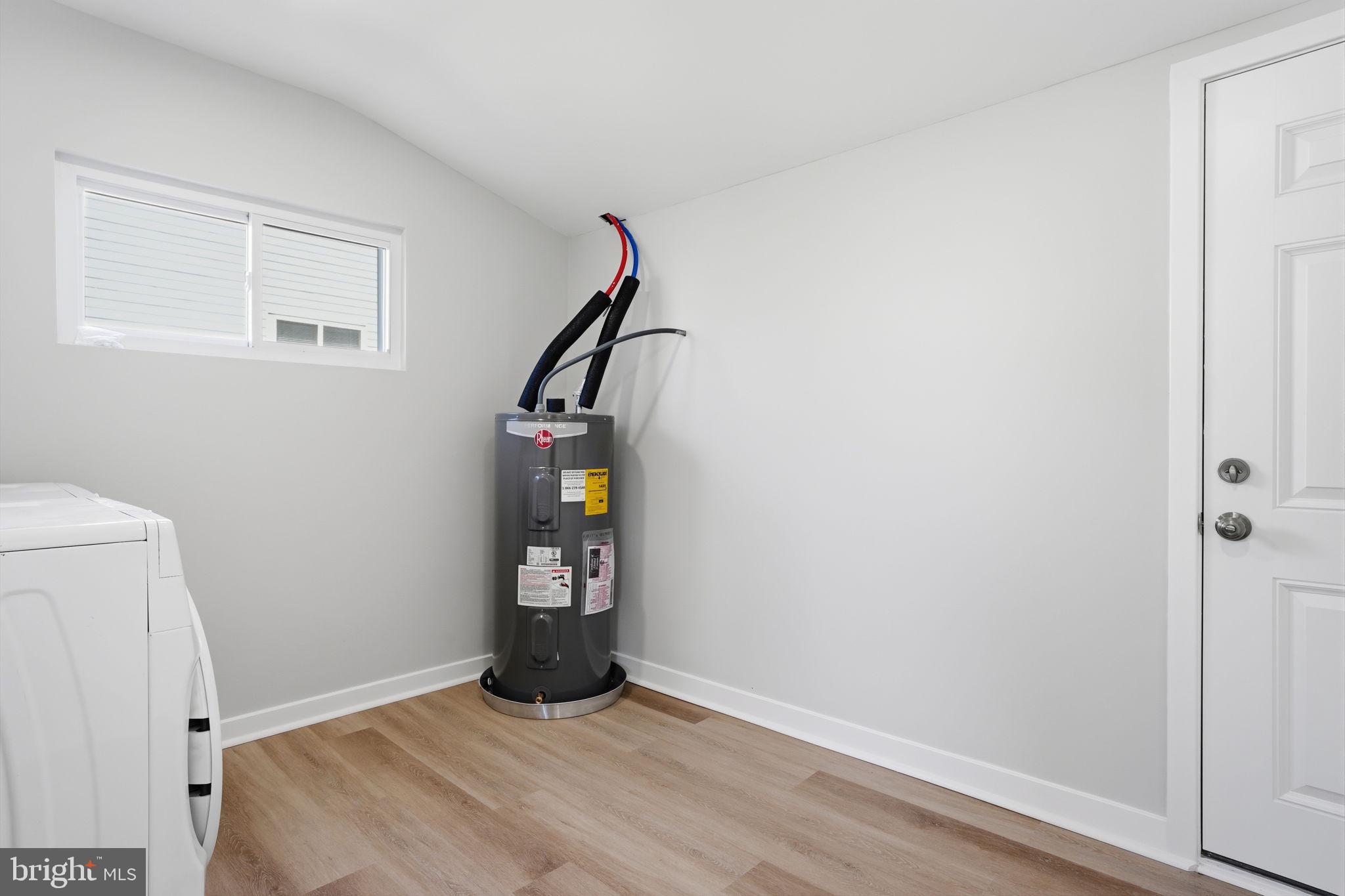 10 MacIntosh Road Levittown, PA 19056 - Photo 36 of 41 a view of an empty room with a window