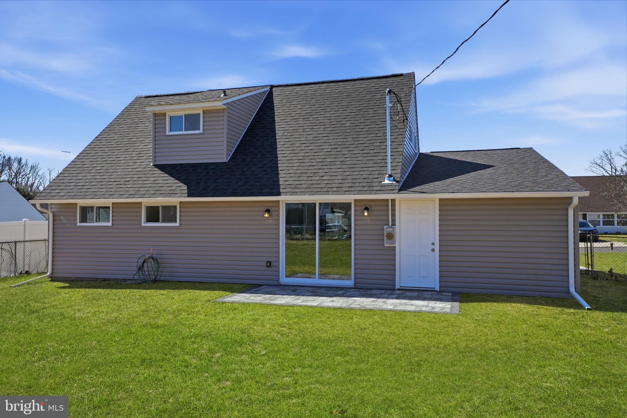 10 MacIntosh Road Levittown, PA 19056 - Photo 38 of 41 a front view of a house with a yard
