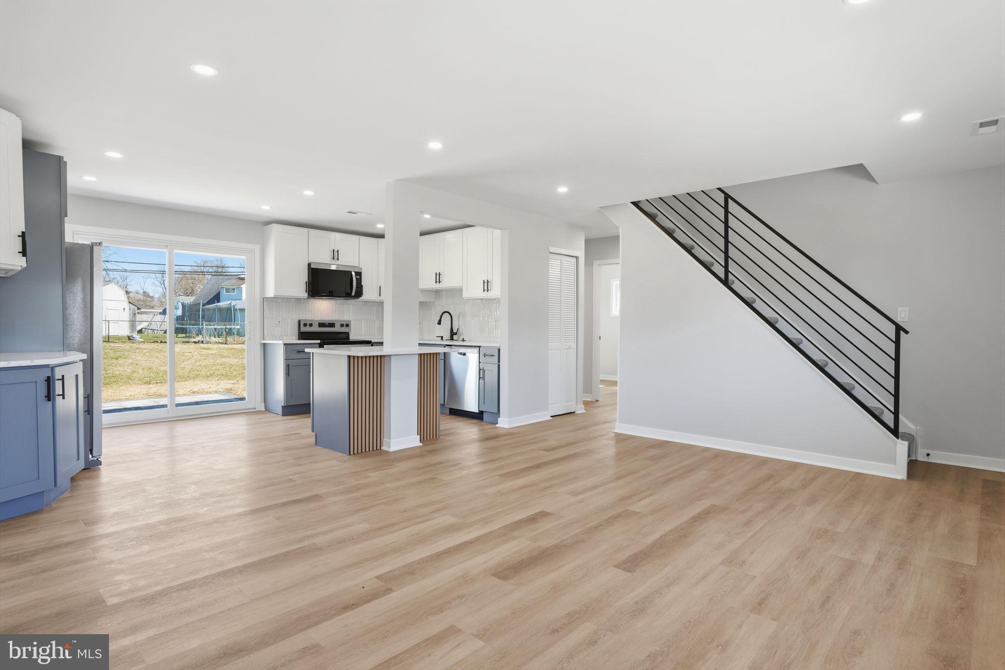 10 MacIntosh Road Levittown, PA 19056 - Photo 8 of 41 a view of kitchen with wooden floor