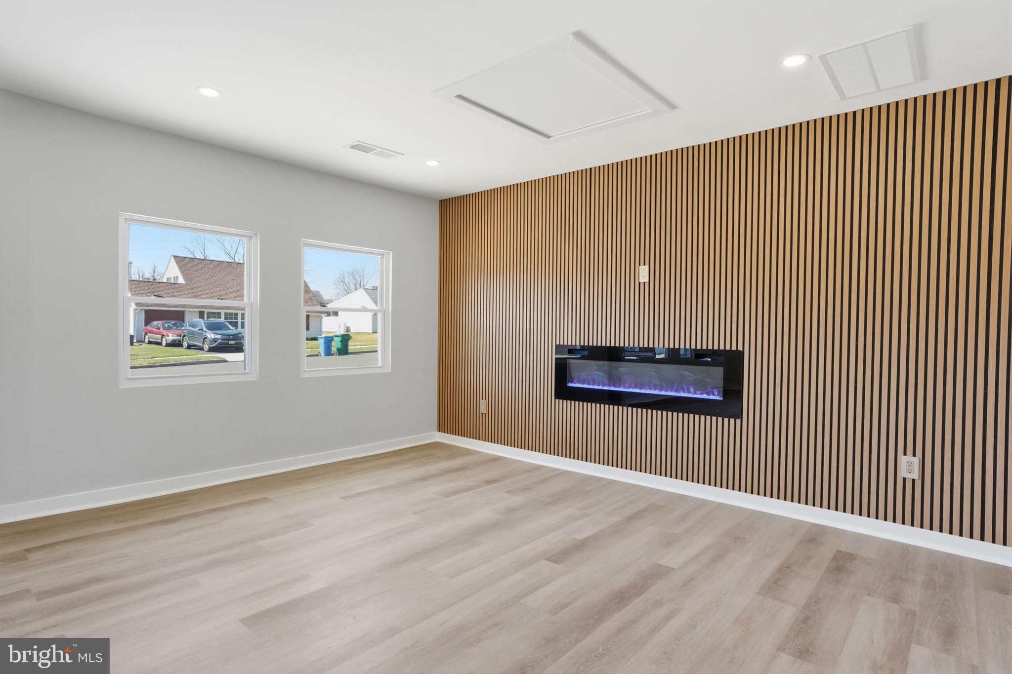 10 MacIntosh Road Levittown, PA 19056 - Photo 10 of 41 a view of an empty room with a window