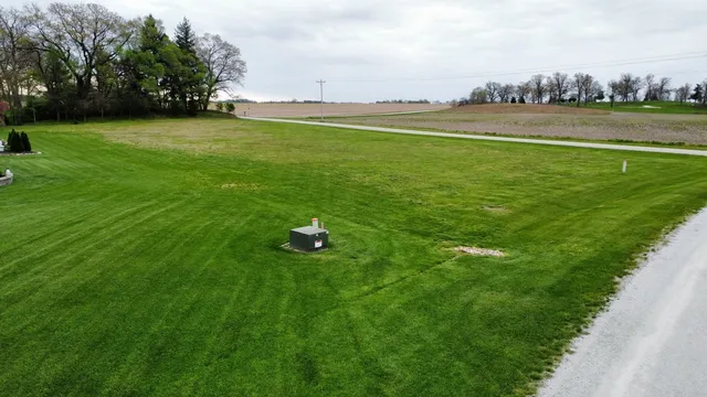 a view of a golf course with a garden