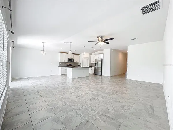 a view of a kitchen with a sink