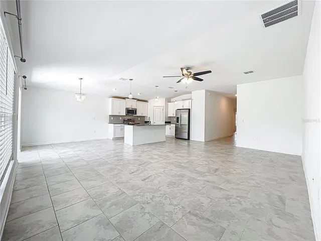 a view of a kitchen with a sink