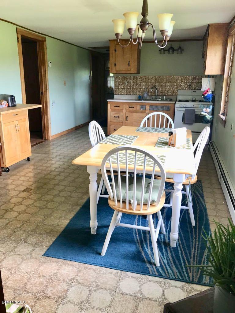 1304 Main Road Savoy, MA 01256 - Photo 10 of 28 a view of a balcony with furniture