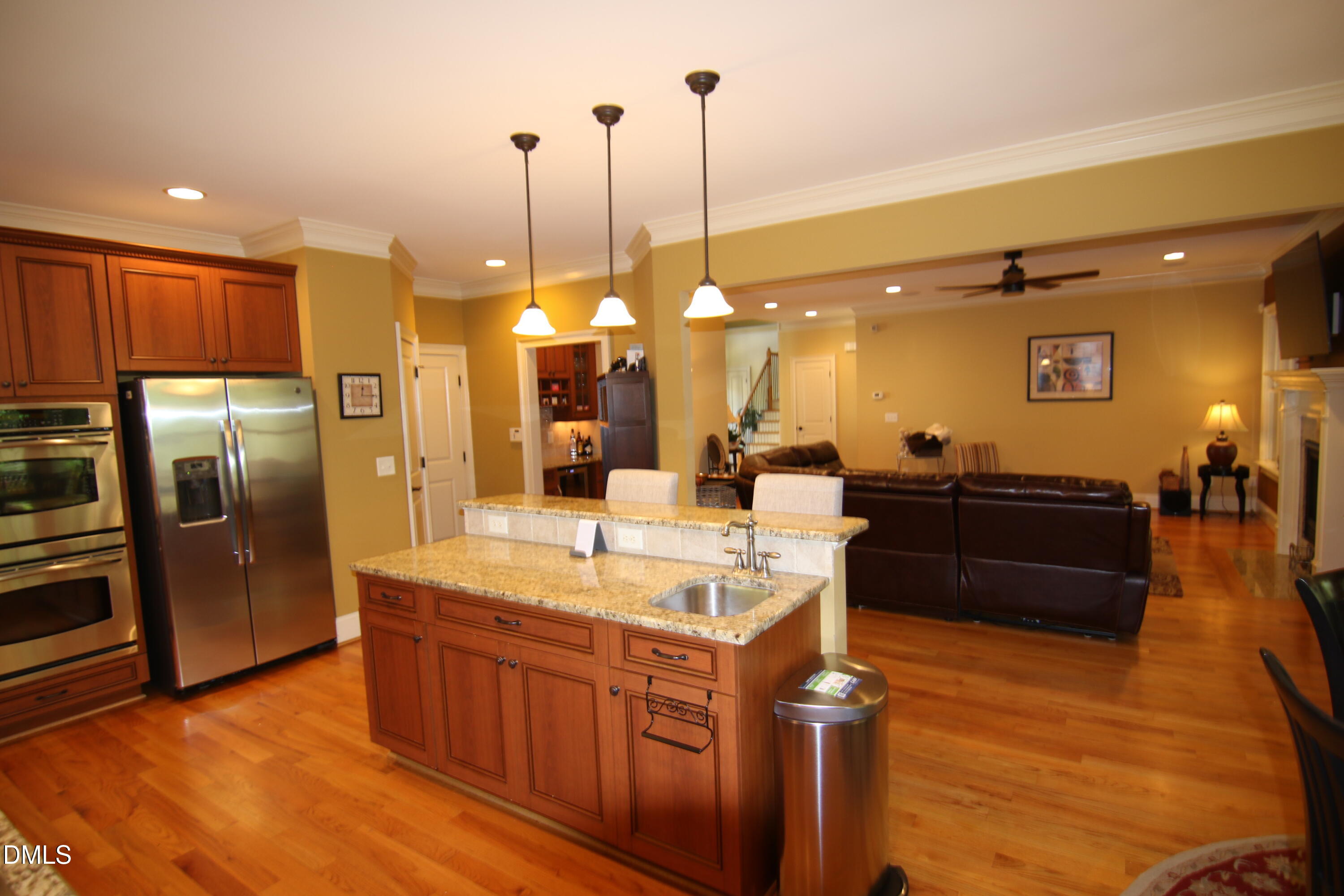8104 Henderson Road Apex, NC 27539 - Photo 45 of 45 a large kitchen with kitchen island a large counter top