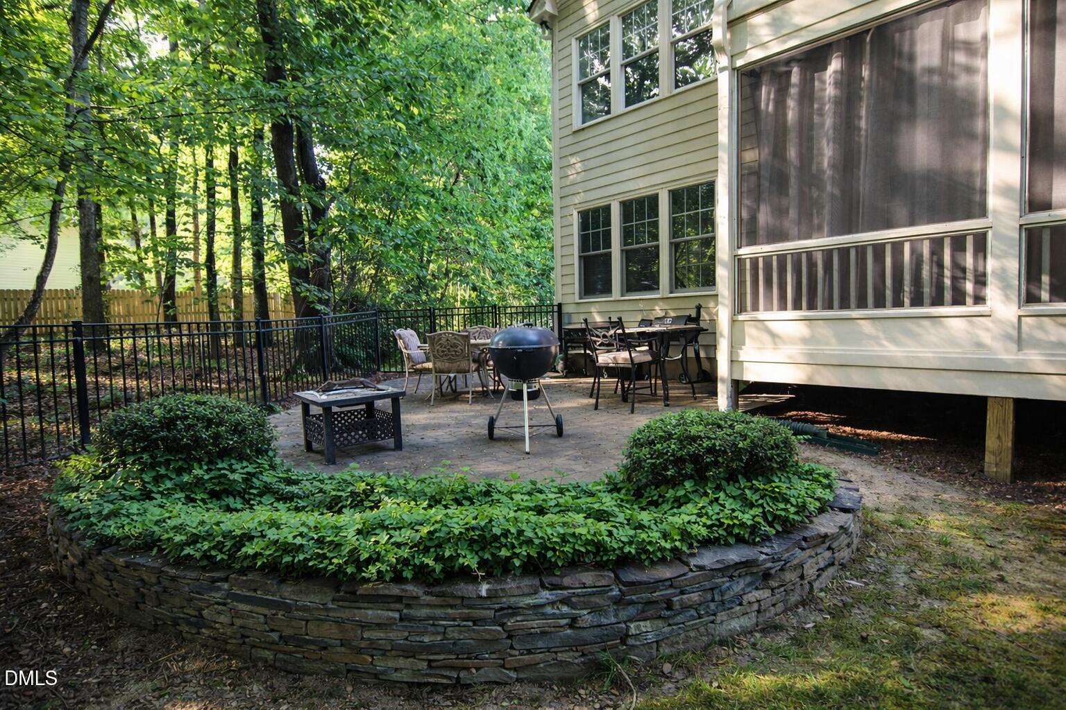 8104 Henderson Road Apex, NC 27539 - Photo 4 of 45 a garden view with a seating space
