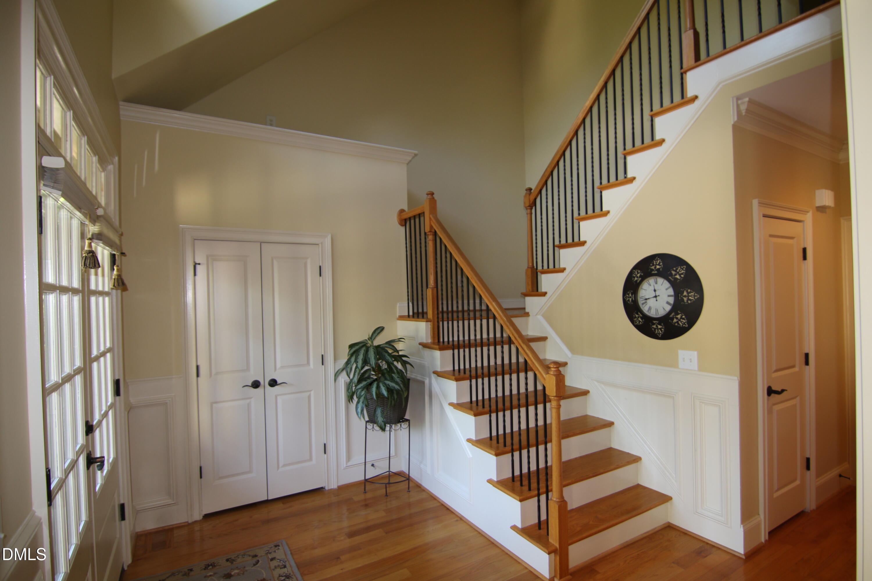 8104 Henderson Road Apex, NC 27539 - Photo 7 of 45 a view of entryway with wooden floor