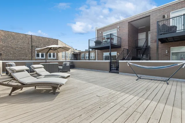 a view of a livingroom with a furniture
