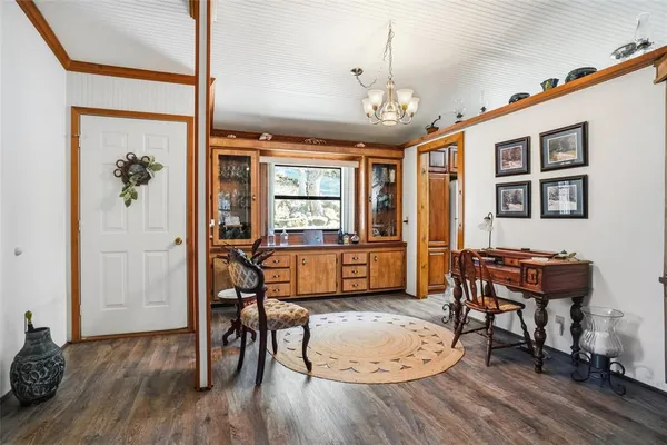 a kitchen with stainless steel appliances granite countertop a stove sink and microwave