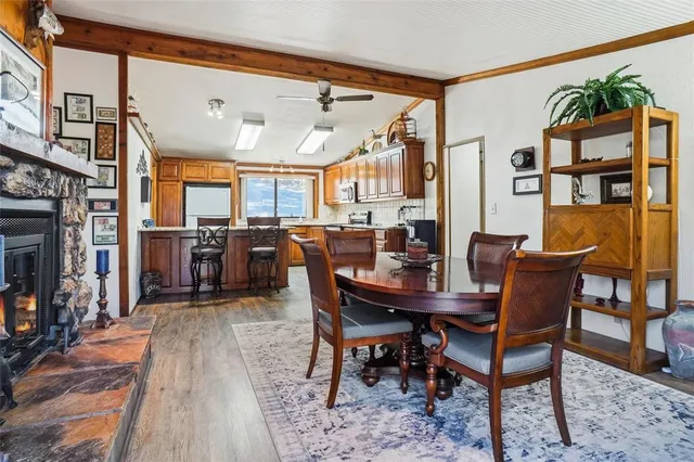 a spacious bedroom with a bed and a chandelier