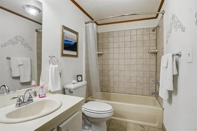 a view of a patio with furniture and wooden floor