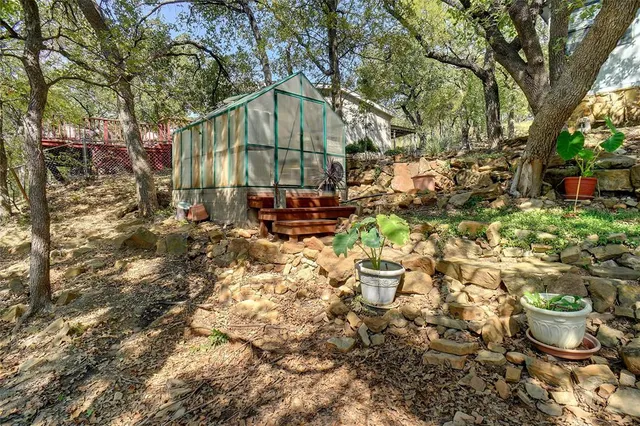 a view of a lake with sitting area