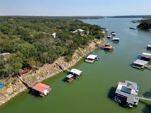 an aerial view of a house with a garden