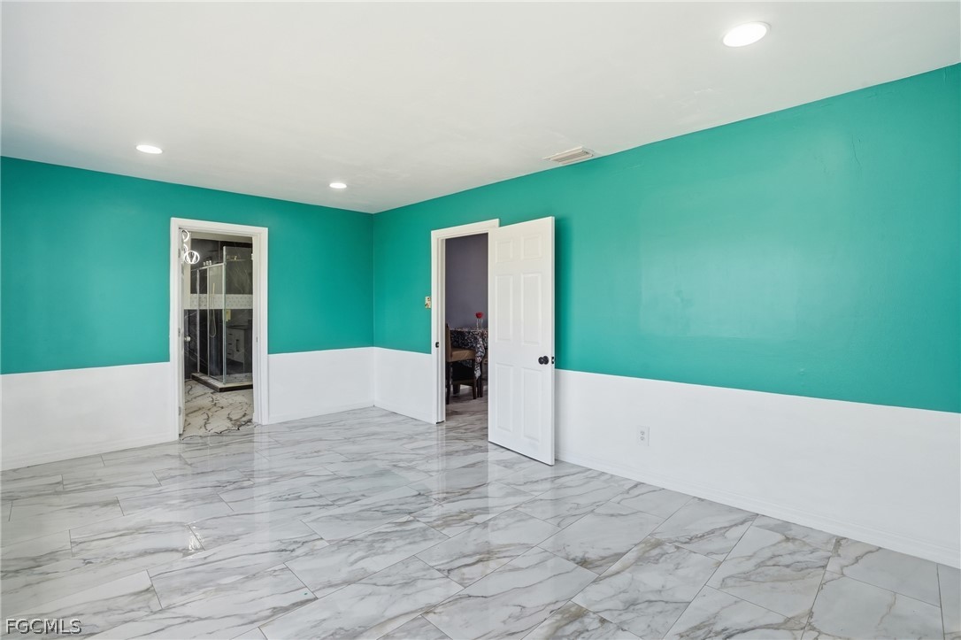 2180 Cook Lane Alva, FL 33920 - Photo 17 of 46 a view of an empty room with closet and entertaining space