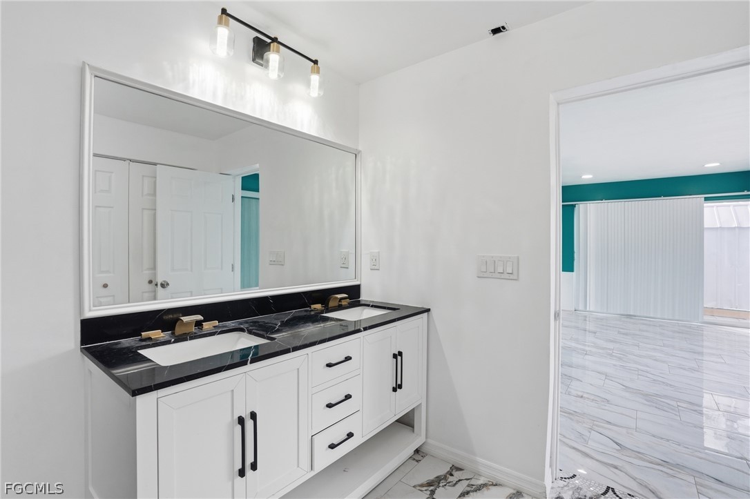 2180 Cook Lane Alva, FL 33920 - Photo 21 of 46 a view of kitchen with sink and stove