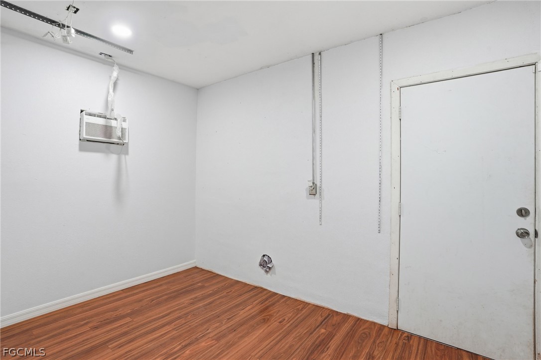 2180 Cook Lane Alva, FL 33920 - Photo 29 of 46 a view of empty room with wooden floor