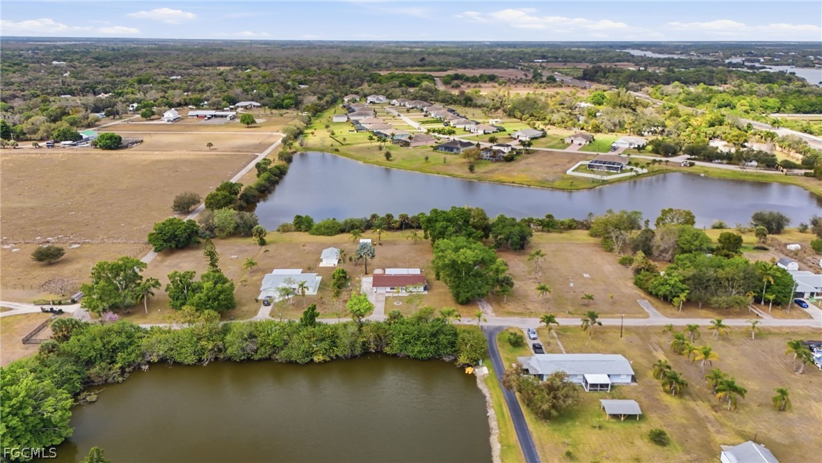 2180 Cook Lane Alva, FL 33920 - Photo 37 of 46 an aerial view of residential houses with outdoor space